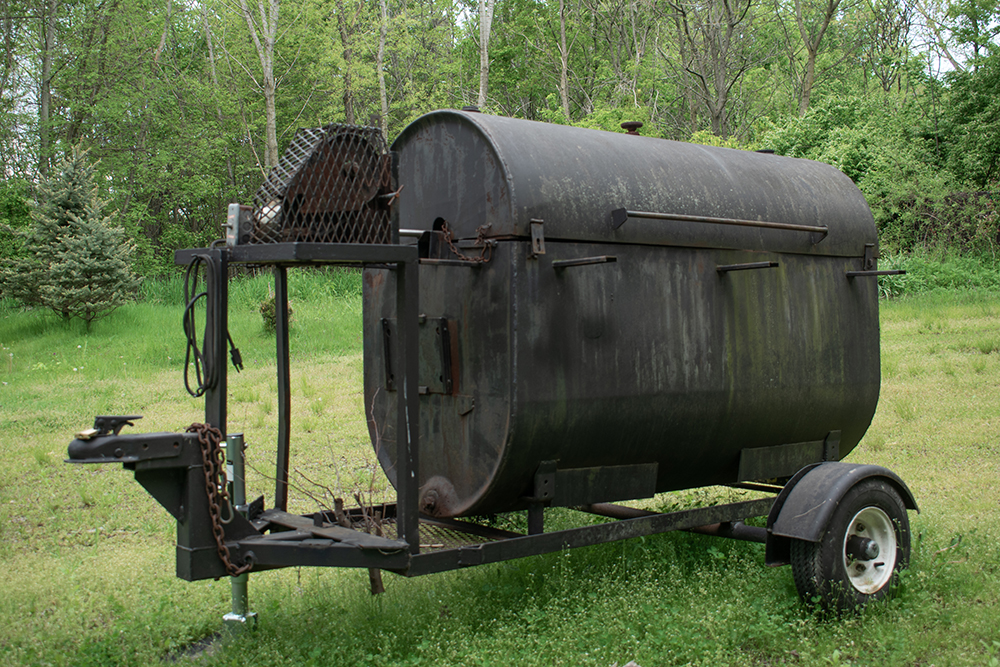 Antique grill in grassy field. Product photography for Relic Vintage.