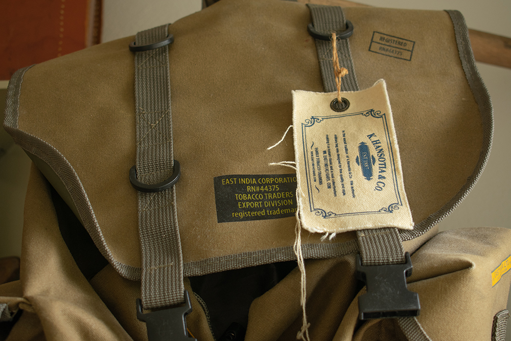 Vintage bookbag with canvas tag close-up. Product photography for Relic Vintage.